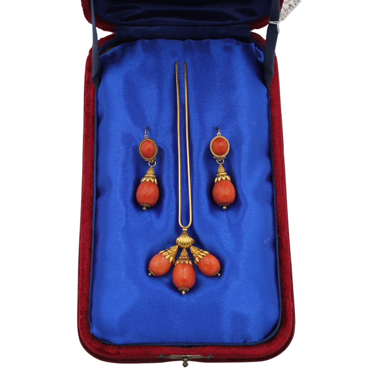 Parure di orecchini e fermacapelli